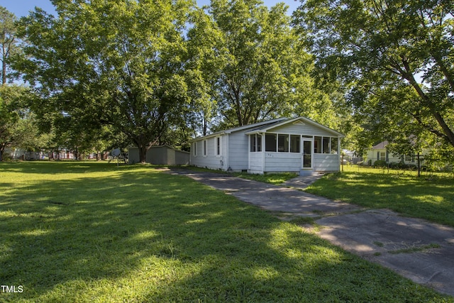 803 Hare St, Selma, NC 27576 - view of front facade with a sunroom and crawl space
