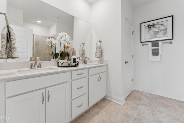 144 N White St # 100, Wake Forest, NC 27587 - full bath featuring double vanity, tiled shower, baseboards, and recessed lighting