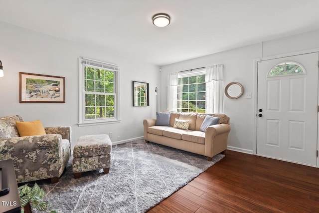 1207 Grant St, Durham, NC 27701 - living area featuring wood finished floors and baseboards