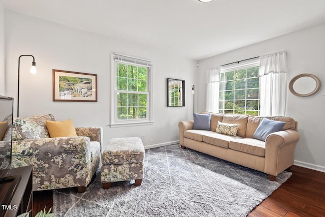 1207 Grant St, Durham, NC 27701 - living area with baseboards and wood finished floors