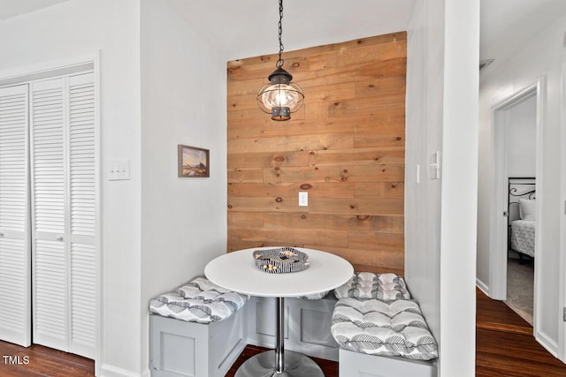 1207 Grant St, Durham, NC 27701 - dining room featuring breakfast area, dark wood finished floors, and baseboards