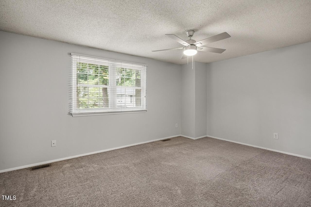 7731 Kingsberry Ct, Raleigh, NC 27615 - empty room with carpet flooring, a ceiling fan, and a textured ceiling