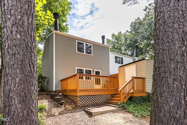 7731 Kingsberry Ct, Raleigh, NC 27615 - rear view of house with a deck