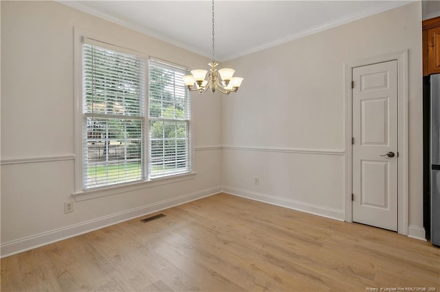 196 Leaning Pine Cir, Spring Lake, NC 28390 - unfurnished room with a chandelier, light wood-type flooring, crown molding, and baseboards