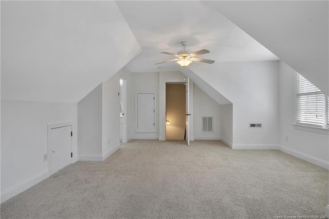 196 Leaning Pine Cir, Spring Lake, NC 28390 - additional living space featuring a ceiling fan, light colored carpet, vaulted ceiling, and baseboards