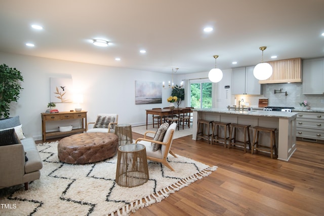 5012 Skidmore St, Raleigh, NC 27609 - living room with wood finished floors and recessed lighting