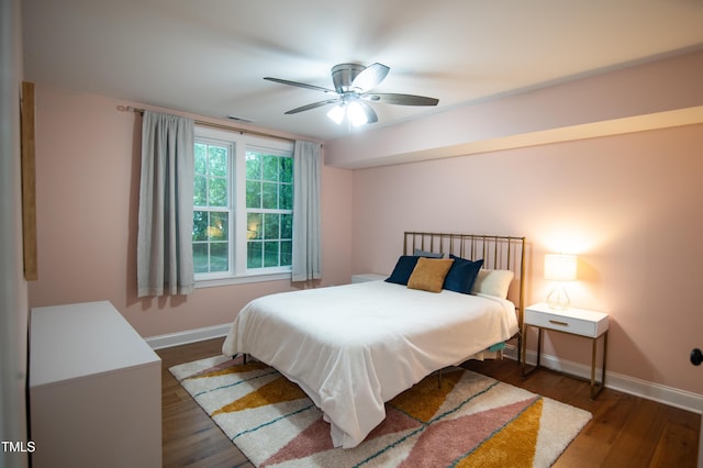 5012 Skidmore St, Raleigh, NC 27609 - bedroom featuring wood finished floors and ceiling fan