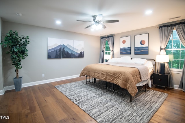 5012 Skidmore St, Raleigh, NC 27609 - bedroom featuring wood finished floors, ceiling fan, and recessed lighting