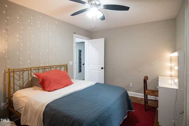 5012 Skidmore St, Raleigh, NC 27609 - bedroom with wood finished floors and ceiling fan