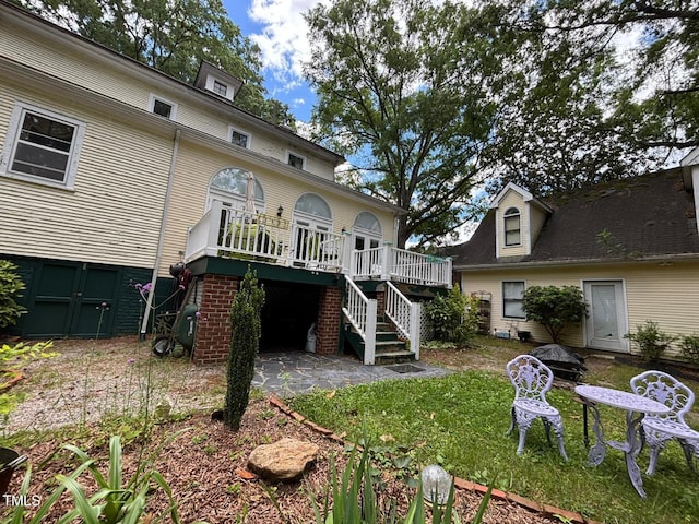 331 N Main St, Warrenton, NC 27589 - rear view of property with a deck, a patio, and stairs