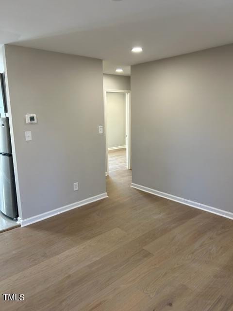407 Bledsoe Ave, Raleigh, NC 27601 - spare room featuring wood finished floors and recessed lighting