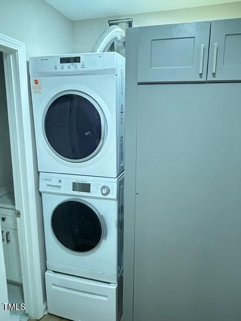 407 Bledsoe Ave, Raleigh, NC 27601 - laundry area with estacked washer and dryer