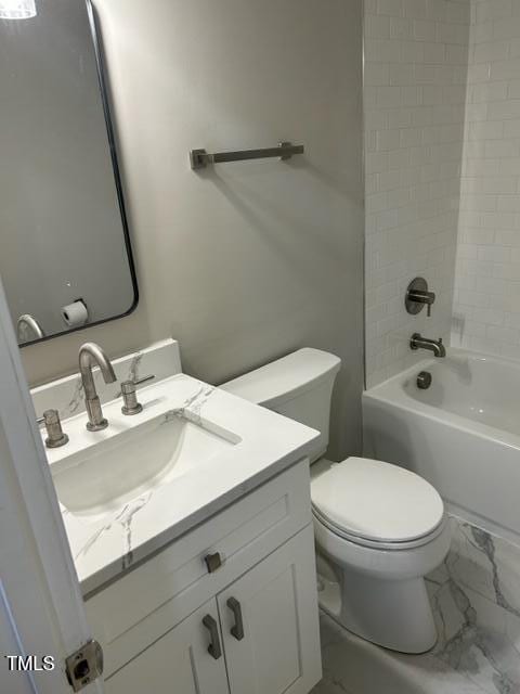 407 Bledsoe Ave, Raleigh, NC 27601 - bathroom with vanity, marble look tiles, and tub / shower combination