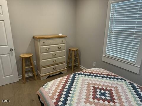 407 Bledsoe Ave, Raleigh, NC 27601 - bedroom featuring wood finished floors and baseboards