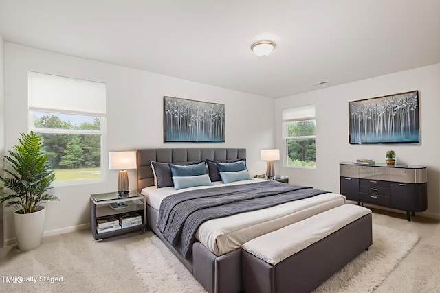 6044 Lowgrass Rd, Stedman, NC 28391 - bedroom featuring light carpet and baseboards