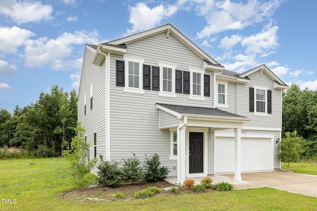 6044 Lowgrass Rd, Stedman, NC 28391 - traditional home with a garage, driveway, and a front yard