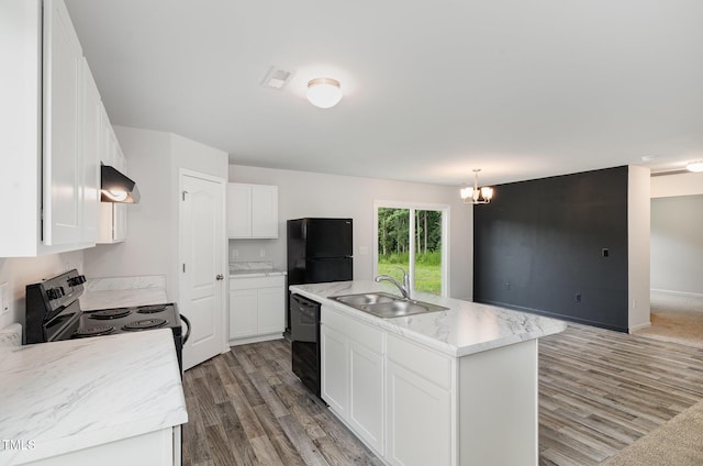 6044 Lowgrass Rd, Stedman, NC 28391 - kitchen with black appliances, a sink, light wood-type flooring, ventilation hood, and white cabinets