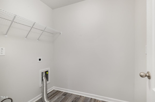 6044 Lowgrass Rd, Stedman, NC 28391 - laundry room featuring electric dryer hookup, dark wood-type flooring, and baseboards