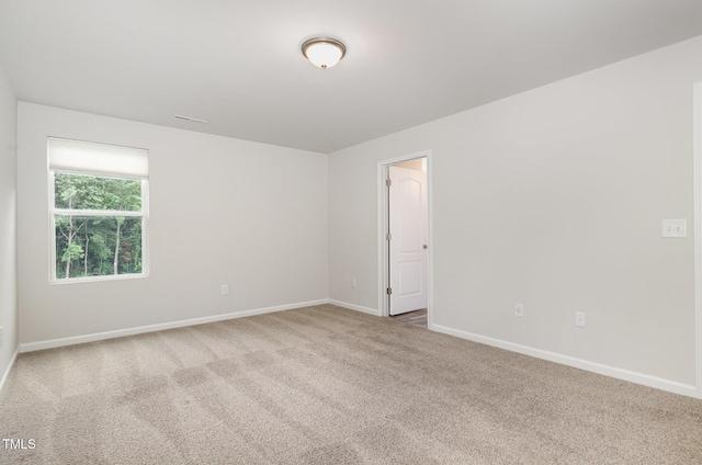 6044 Lowgrass Rd, Stedman, NC 28391 - carpeted spare room featuring baseboards