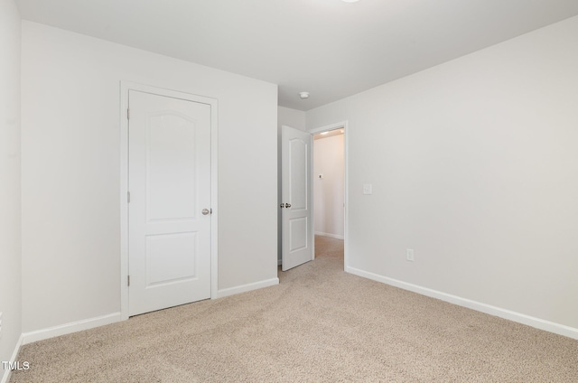 6044 Lowgrass Rd, Stedman, NC 28391 - unfurnished bedroom featuring carpet and baseboards
