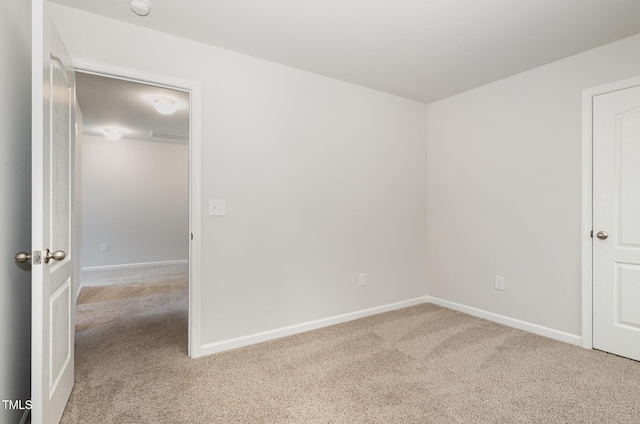 6044 Lowgrass Rd, Stedman, NC 28391 - unfurnished bedroom with light carpet and baseboards