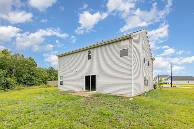 6044 Lowgrass Rd, Stedman, NC 28391 - rear view of property featuring a yard