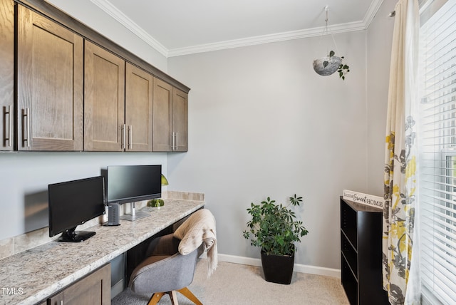 9300 Lake Wheeler Rd, Fuquay Varina, NC 27526 - carpeted home office featuring built in desk, crown molding, and baseboards