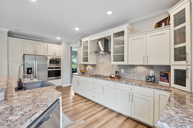 9300 Lake Wheeler Rd, Fuquay Varina, NC 27526 - kitchen featuring appliances with stainless steel finishes, wall chimney range hood, crown molding, a sink, and tasteful backsplash