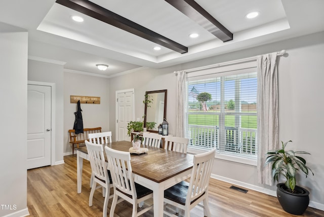 9300 Lake Wheeler Rd, Fuquay Varina, NC 27526 - dining area with light wood-type flooring, baseboards, a raised ceiling, recessed lighting, and ornamental molding