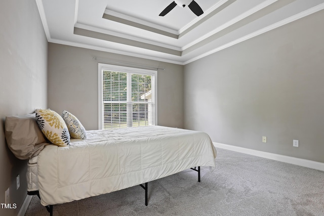 37 Meadow Oaks Cir, Smithfield, NC 27577 - carpeted bedroom featuring ornamental molding, a tray ceiling, ceiling fan, and baseboards