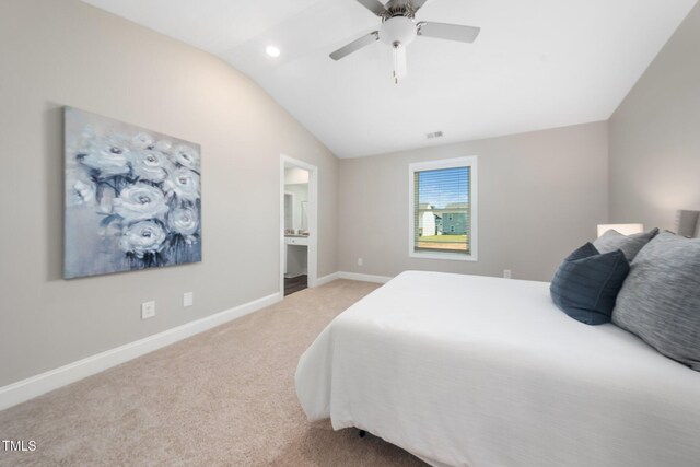 304 Azalea Gaze Dr, Youngsville, NC 27596 - bedroom with carpet floors, lofted ceiling, baseboards, ceiling fan, and ensuite bath