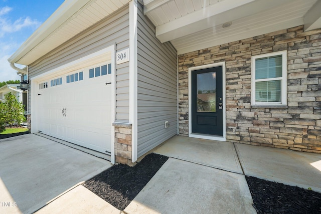 304 Azalea Gaze Dr, Youngsville, NC 27596 - property entrance featuring stone siding