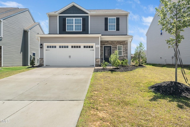 304 Azalea Gaze Dr, Youngsville, NC 27596 - craftsman-style home with stone siding, driveway, an attached garage, and a front yard