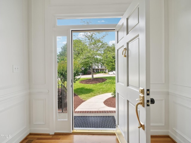 305 Promontory Point Dr, Cary, NC 27513 - entryway with a decorative wall and wood finished floors