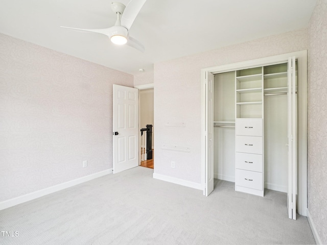 305 Promontory Point Dr, Cary, NC 27513 - unfurnished bedroom with light colored carpet, a closet, a ceiling fan, and baseboards