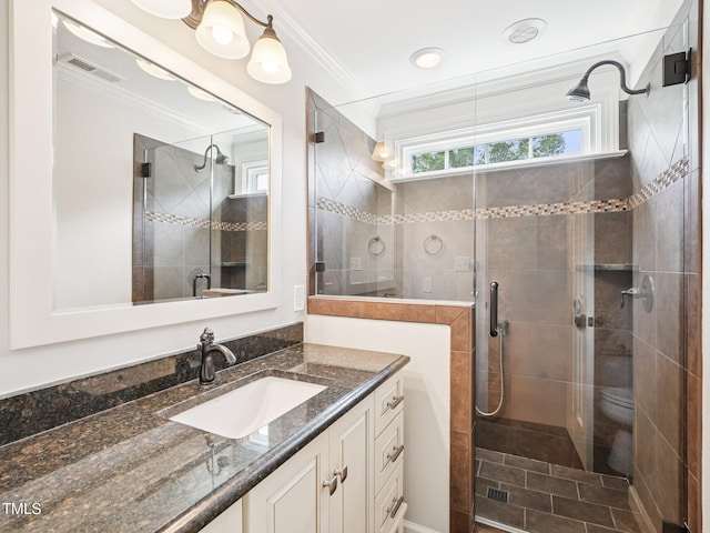 305 Promontory Point Dr, Cary, NC 27513 - bathroom featuring vanity, a stall shower, and ornamental molding