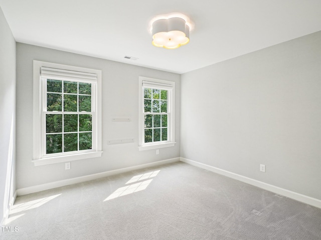 305 Promontory Point Dr, Cary, NC 27513 - carpeted empty room with baseboards
