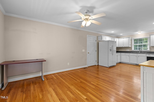 304 Foxcroft Dr, Timberlake, NC 27583 - kitchen featuring white refrigerator with ice dispenser, crown molding, white cabinetry, light wood-style flooring, and dishwasher