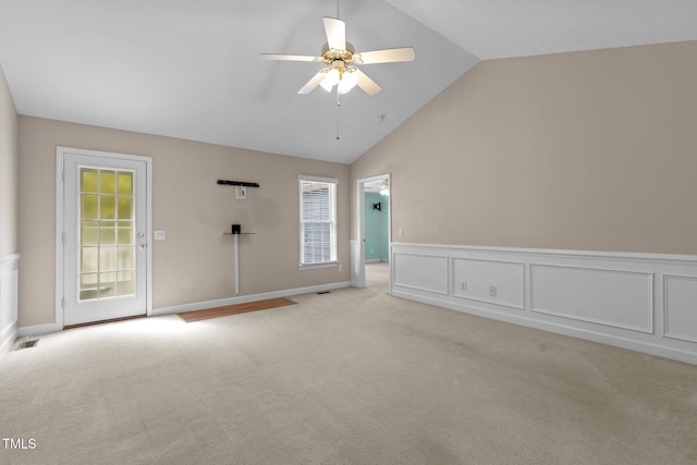 304 Foxcroft Dr, Timberlake, NC 27583 - unfurnished room featuring light carpet, a ceiling fan, a wainscoted wall, and high vaulted ceiling