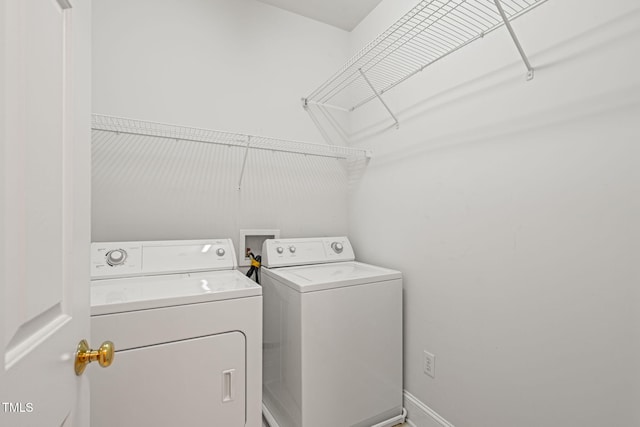 4831 Crestmore Rd Unit 202, Raleigh, NC 27612 - laundry room with washer and clothes dryer