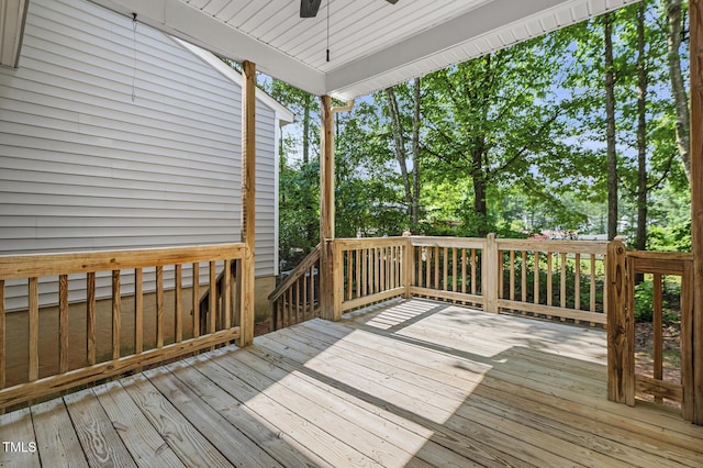 2623 Broad Oaks Pl, Raleigh, NC 27603 - wooden deck with a ceiling fan and view of wooded area
