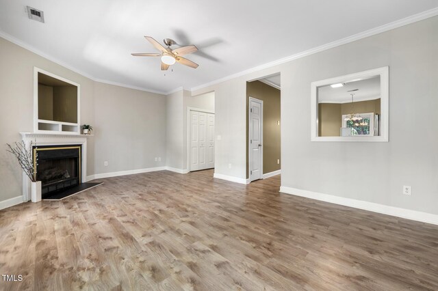 2623 Broad Oaks Pl, Raleigh, NC 27603 - unfurnished living room with a ceiling fan, ornamental molding, wood finished floors, and baseboards