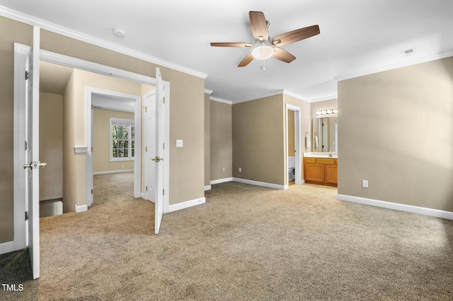 2623 Broad Oaks Pl, Raleigh, NC 27603 - unfurnished bedroom featuring crown molding, baseboards, light colored carpet, a sink, and ensuite bath