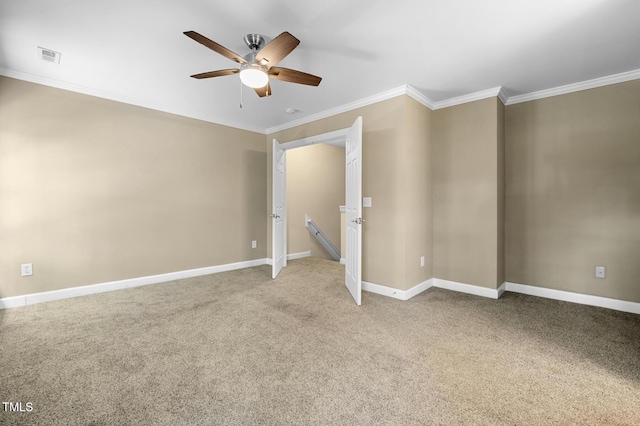 2623 Broad Oaks Pl, Raleigh, NC 27603 - spare room with ceiling fan, ornamental molding, baseboards, and light colored carpet