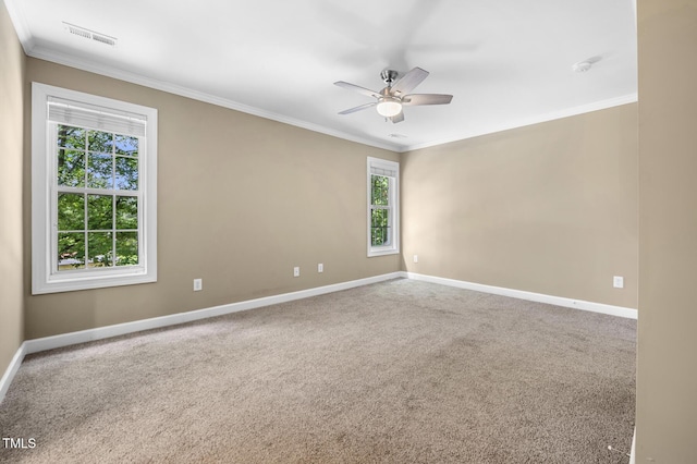 2623 Broad Oaks Pl, Raleigh, NC 27603 - carpeted spare room with ornamental molding, ceiling fan, baseboards, and a smoke detector