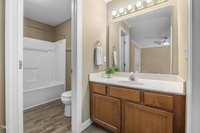 2623 Broad Oaks Pl, Raleigh, NC 27603 - full bathroom with vanity, ceiling fan, ornamental molding, toilet, and washtub / shower combination