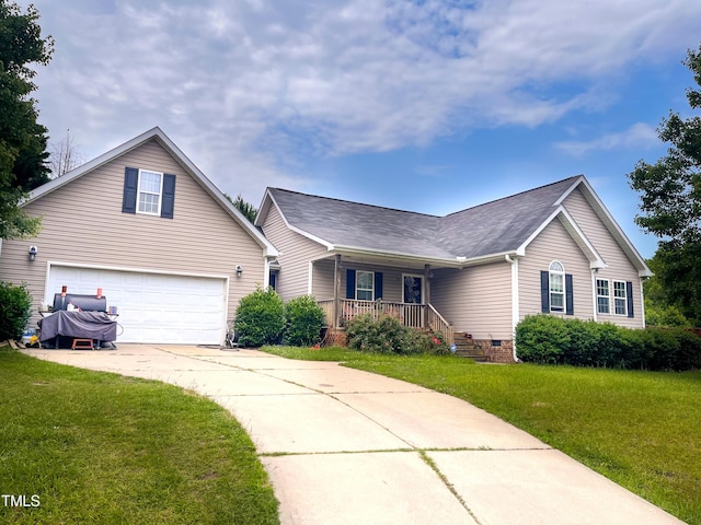 101 Langston Ridge Dr, Angier, NC 27501 - ranch-style home featuring a porch, concrete driveway, a front yard, a garage, and roof with shingles