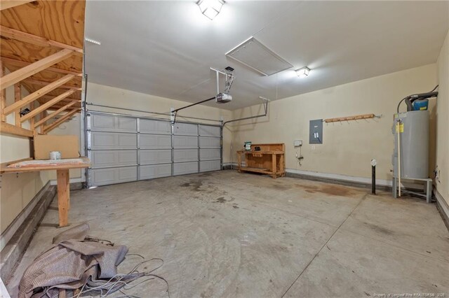 267 Driftwood Ln, Raeford, NC 28376 - garage featuring water heater, electric panel, and a garage door opener