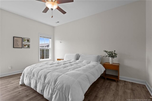 117 Titleist Ct, Raeford, NC 28376 - bedroom with wood finished floors, baseboards, and ceiling fan