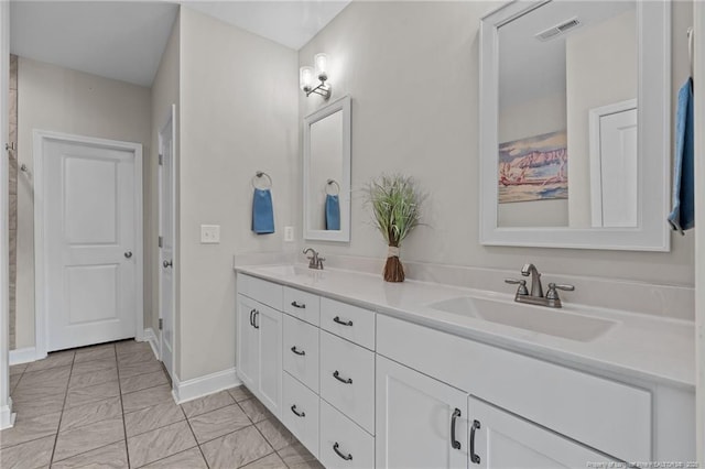 117 Titleist Ct, Raeford, NC 28376 - full bathroom featuring double vanity and baseboards